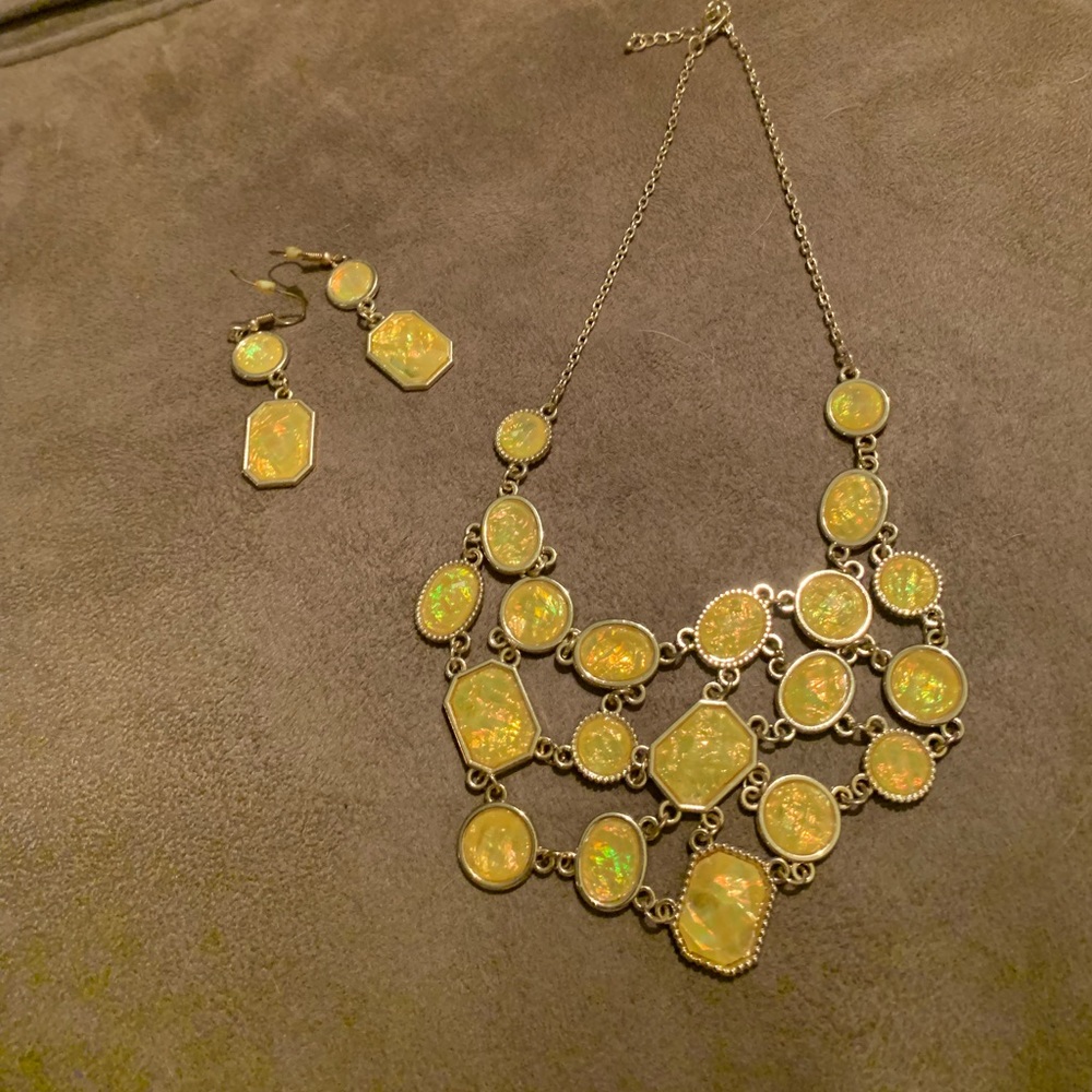 Yellow costume jewelry necklace and earring set.